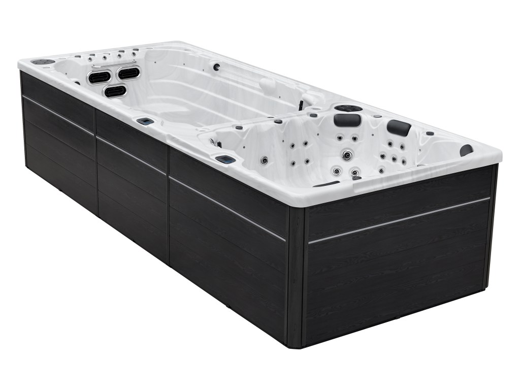 Ein luxuriöses Swim SPA Valhalla mit separatem Whirlpoolbereich, ausgestattet mit ergonomischen Liegen und Massagedüsen in modernem Design.